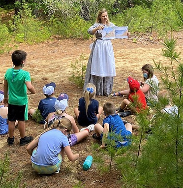 Students learning on the dunes at the Desert of Maine